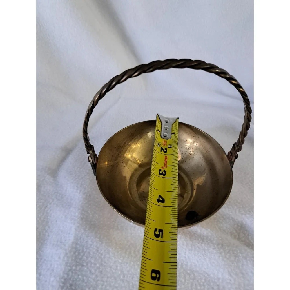 Solid brass candy dish, potpourri bowl, etc. Handcrafted in India Handle folds‎